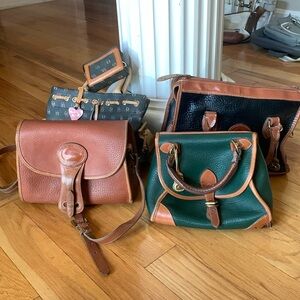 4 Dooney and Bourke purses and one wallet